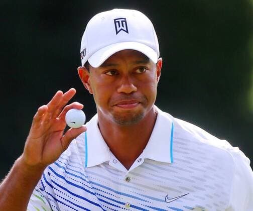 Sept. 20, 2012 - Atlanta, GA, USA - Tiger Woods acknowledges the gallery after making a birdie putt on the 9th green during first round play in the Tour Championship and FedEx Cup finale at East Lake Golf Club in Atlanta, Georgia, Thursday, September 20, 2012. Tour Championship - ZUMAm67