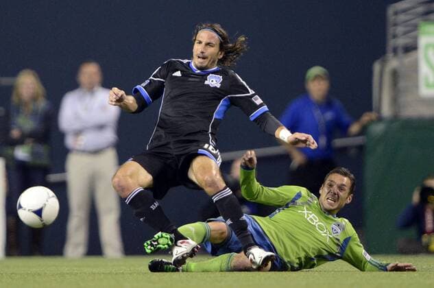 September 22, 2012. .Seattle Sounders FC midfielder Christian Tiffert 13 is called for a foul against San Jose Earthquakes forward Alan Gordon 16 at CenturyLink Field in Seattle, WA.. .San Jose Earthquakes defeat Seattle Sounders FC 2 - 1.George Holland Cal Media. MLS Fussball Herren USA 2012: Earthquakes vs Sounders FC SEP 22 - ZUMAch4