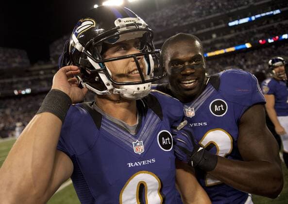 Baltimore Ravens kicker kicker Justin Tucker (L) celebrates with James Ihedigbo after Tucker kicked a game winning 27-yard field goal against the New England Patriots at M&T Bank Stadium in Baltimore, Maryland on September 23, 2012. The Ravens defeated the Patriots 31-30.  WAP20120923313