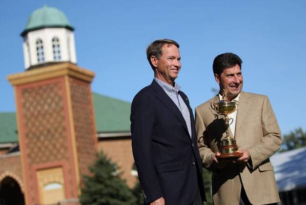 PGA-Ryder Cup 2012 Captains Davis Love III and Jose Maria Olazabal pose for pictures with the Ryder Cup in front of the Medinah clubhouse Monday afternoon. 