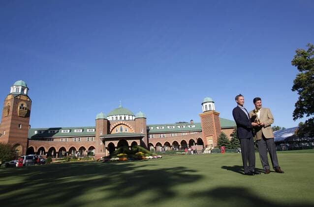 PGA-Ryder Cup 2012 Captains Davis Love III and Jose Maria Olazabal pose for pictures with the Ryder Cup in front of the Medinah clubhouse Monday afternoon. 