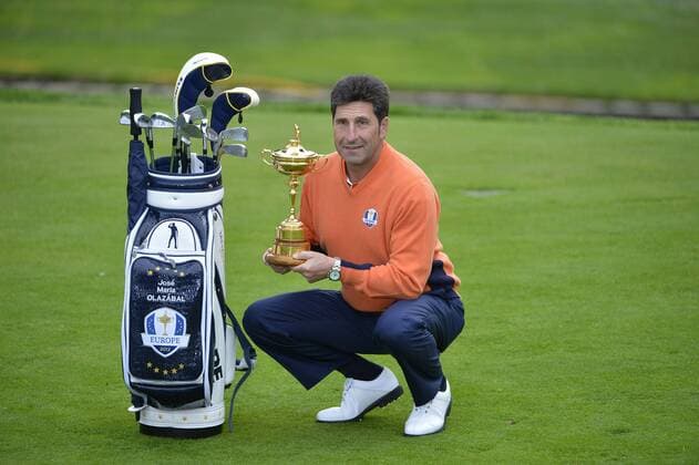 European team captain Jose Maria Olazabal of Spain poses with the Ryder Cup trophy before the start of the 39th Ryder Cup at Medinah Country Club on Tuesday, September 25, 2012 in Medinah, Illinois. Ryder Cup tournament play begins Friday.  BKX20120925