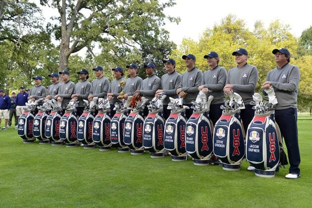 United States Ryder Cup team members Zach Johnson (L-R) Webb Simpson, Jim Furyk, Bubba Watson, Matt Kuchar, Phil Mickelson, team captain Davis Love III, Tiger Woods, Keegan Bradley, Dustin Johnson, Brandt Snedeker, Steve Stricker and Jason Dufner pose for a team photo at the 39th Ryder Cup at Medinah Country Club on Tuesday, September 25, 2012 in Medinah, Illinois. Ryder Cup tournament play begins Friday. BKX2012092545
