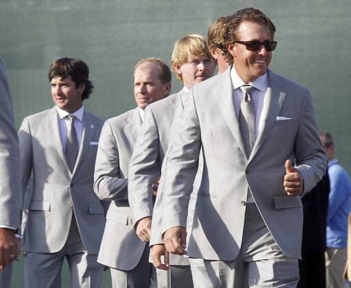Phil Mickelson, (R) of team USA leads Brandt Snedeker, Steve Stricker and Bubba Watson into the opening ceremonies of the Ryder Cup at the Medinah Country Club in Medinah, IL on September 27, 2012. Team USA takes on team Europe to try and win back the cup after a loss in 2010.  MED2012092701