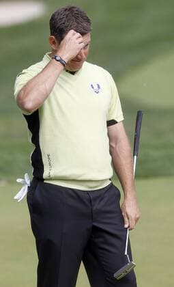 England s Lee Westwood reacts to missing a putt on the 14th green at the 39th Ryder Cup at Medinah Country Club on September 28, 2012 in Medinah, Illinois.  MED2012092802