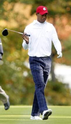 Team USA s Tiger Woods react to a errant tee shot on the 5th tee at the 39th Ryder Cup at Medinah Country Club on September 28, 2012 in Medinah, Illinois.  MED2012092816