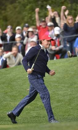 Team USA s Phil Mickelson reacts after sinking a birdie putt on the 13th hole at the 39th Ryder Cup at Medinah Country Club on September 28, 2012 in Medinah, Illinois.  BKX2012092837