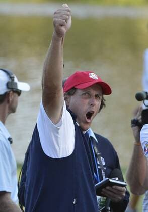 Team USA s Phil Mickelson yells to the crowd after he and teammate won their match on the 17th hole at the 39th Ryder Cup at Medinah Country Club on September 28, 2012 in Medinah, Illinois.  BKX2012092881