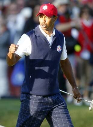 Team USA s Tiger Woods reacts to a birdie putt on the 14th green at the 39th Ryder Cup at Medinah Country Club on September 28, 2012 in Medinah, Illinois.  MED2012092836