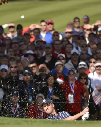 Team USA s Webb Simpson blasts out of a bunker and onto the 14th green at the 39th Ryder Cup at Medinah Country Club on September 29, 2012 in Medinah, Illinois.  BKX2012092920