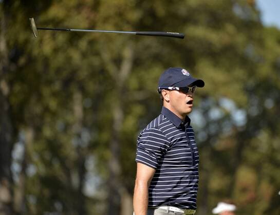 Team USA s Zach Johnson tosses his clip after missing a birdie put on the eighth hole at the 39th Ryder Cup at Medinah Country Club on September 29, 2012 in Medinah, Illinois. After the second day of play the United States leads Europe 10-6 and needs 4 1 2 points in the final round to win the Ryder Cup.  BKX2012092947
