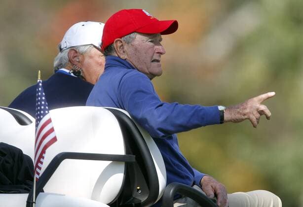 Former President George H. Bush watches the 39th Ryder Cup at Medinah Country Club from the 5th hole on September 29, 2012 in Medinah, Illinois. After two days the United States leads team Europe 10-6.  MED2012092922