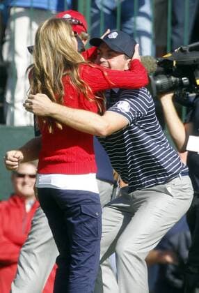 Team USA s Keegan Bradley hugs his girlfriend Jillian Stacey at the 39th Ryder Cup at Medinah Country Club on September 29, 2012 in Medinah, Illinois.  MED2012092902