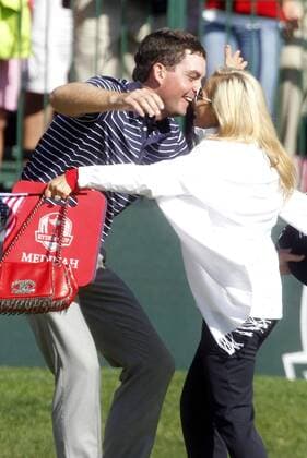 Team USA s Keegan Bradley hugs Phil Mickelson s wife Amy Mickelson at the 39th Ryder Cup at Medinah Country Club on September 29, 2012 in Medinah, Illinois.  MED2012092903