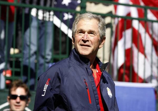 29 September, 2012: Former US President, George W. Bush, smiles for the fans during day two of Ryder Cup action during the afternoon round, at Medinah Country Club, in Medinah, IL. GOLF: SEP 29 PGA Golf Herren - Ryder Cup Icon207146 EDITORIAL USE ONLY