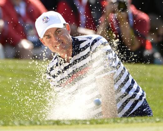 Team USA s Keegan Bradley chips out of a bunker and onto the fourth green during the singles matches at the 39th Ryder Cup at Medinah Country Club on September 30, 2012 in Medinah, Illinois.  CHI2012093007