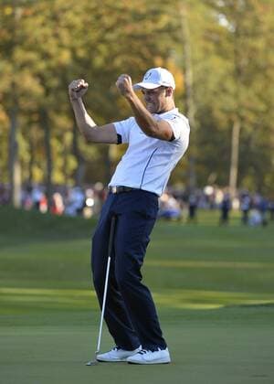 Team Europe s Martin Kaymer of Germany celebrates after sinking a par putt on the 18th hole to win his match 1 up over Team USA s Steve Stricker and secure the Ryder Cup for Team Europe at the 39th Ryder Cup at Medinah Country Club on September 30, 2012 in Medinah, Illinois. Team Europe defeated Team USA 14 1 2 to 13 1 3 points. 