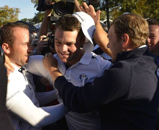 Team Europe s Sergio Garcia of Spain (L-R), Martin Kaymer of Germany and his brother Philipp celebrate Ryder Cup for Europe at the 39th Ryder Cup at Medinah Country Club on September 30, 2012 in Medinah, Illinois. Team Europe defeated Team USA 14 1 2 to 13 1 3 points.  CHI2012093019