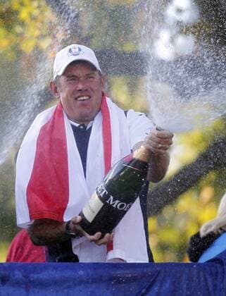 Team Europe s Lee Westwood celebrates their 14 1 2 to 13 1 2 win over the USA at the 39th Ryder Cup at Medinah Country Club on September 30, 2012 in Medinah, Illinois.  MED2012093010