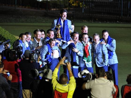Team Europe hoist captain Team Europe captain Jose Maria Olazabal of Spain on their shoulders as they pose for photos at the 39th Ryder Cup at Medinah Country Club on September 30, 2012 in Medinah, Illinois. Team Europe defeated Team USA 14 1 2 to 13 1 3 points.  CHI2012093022