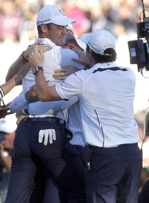Germany s Martin Kaymer, celebrates his win to take the 39th Ryder Cup with his European Teammates at Medinah Country Club on September 29, 2012 in Medinah, Illinois. Europe came from behind to win the Cup 14 1 2 to 13 1 2.  MED2012093006