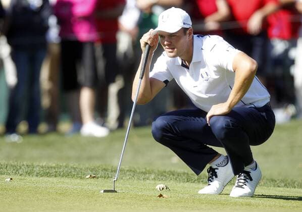 Team Europe s Martin Kaymer, of Germany, lines up a putt on the eighth green at the 39th Ryder Cup at Medinah Country Club on September 29, 2012 in Medinah, Illinois. Europe came from behind to win the Cup 14 1 2 to 13 1 2.  MED2012093026
