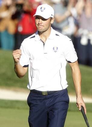 Team Europe s Martin Kaymer, of Germany, celebrates a par putt on the 16th green at the 39th Ryder Cup at Medinah Country Club on September 29, 2012 in Medinah, Illinois. Europe came from behind to win the Cup 14 1 2 to 13 1 2.  MED2012093002