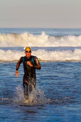 Sept. 30, 2012 - Corondo, California, U.S. - LANCE ARMSTRONG finishes the swimming leg of the Superfrog Triathlon in Coronado on Sunday. While banned from sanctioned events falling under the umbrella of the World Anti-Doping Agency s jurisdiction, Armstrong is free to compete in events like Superfrog. Armstrong Competes in Superfrog Triathlon 2012 - ZUMAf22