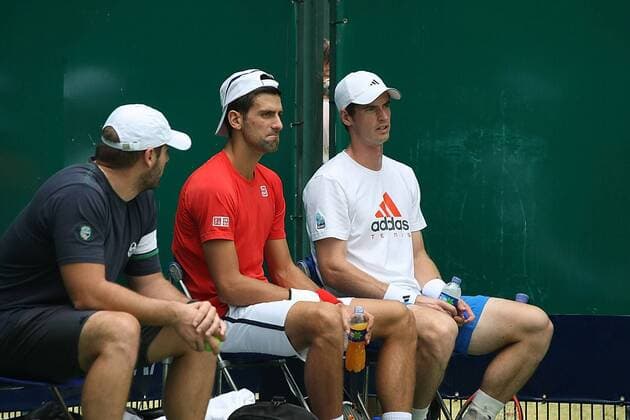 SHANGHAI, CHINA - OCTOBER 09: (CHINA OUT) Novak Djokovic of Serbia (C) and Andy Murray of Britain (R) attend a training session during day three of the Shanghai Rolex Masters at the Qi Zhong Tennis Center on October 9, 2012 in Shanghai, China.  CFP432555398 
