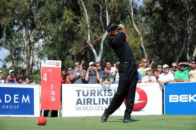 (121009) -- ANTALYA, Oct. 9, 2012 (Xinhua) -- Tiger Woods of the United States hits his tee shot on the fourth hole during his match at the Turkish Airlines World Golf Final at Antalya Golf Club in Antalya, Turkey, October 9, 2012. Turkish Airlines World Golf Final kicked off here on Tuesday. (Xinhua Ma Yan) TURKEY-ANTALYA-WORLD GOLF FINAL 