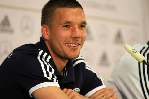 10.10.2012, Frankfurt, DFB-PK, zur Vorbereitung für die WM-Qualifikationsspiele gegen Irland und Schweden, Portrait Nationalspieler Lukas Josef Podolski (Deutsche Nationalmannschaft) Lachend, sehr entspannt