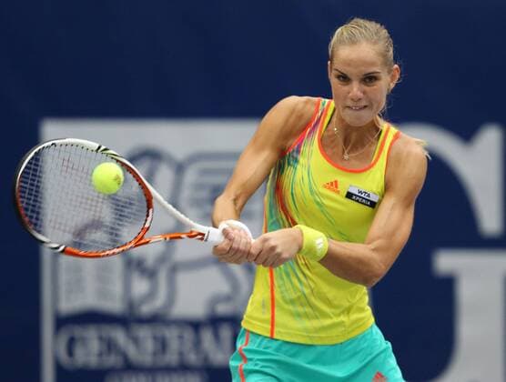 Generali Ladies Linz 2012,WTA Tour, Damen Hallen Tennis Turnier in Linz, Oesterreich, Arantxa Rus (NED), Aktion,Einzelbild,Halbkoerper,Querformat,