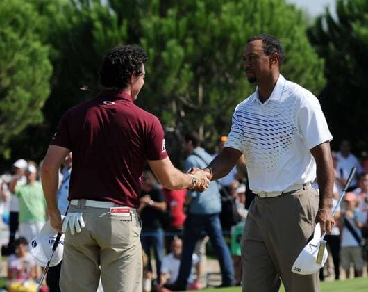 (121011) -- ANTALYA, Oct. 11, 2012 (Xinhua) -- Tiger Woods of the United States (R) shakes hands with Rory McIlroy of Northern Ireland (Nordirland) after their third round of the Turkish Airlines World Golf Final at Antalya Golf Club in Antalya, Turkey, on October 11, 2012. Wood advanced to the semi-finals after a seven-under-par 64 to McIlroy s one-under-par 70. (Xinhua Ma Yan) TURKEY-ANTALYA-WORLD GOLF FINAL 