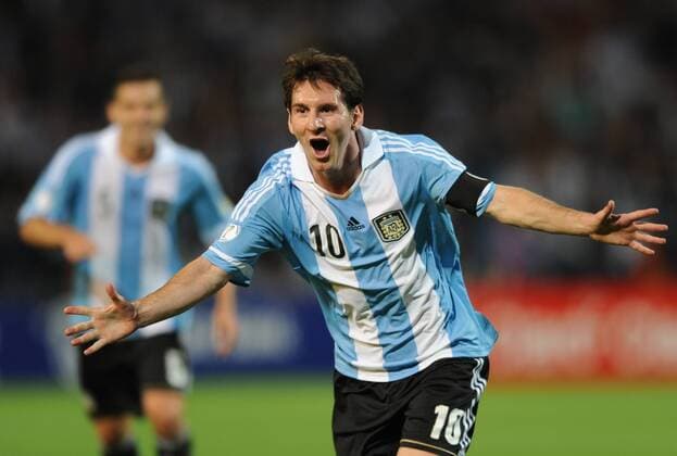 MENDOZA, Oct. 12, 2012 - Lionel Messi (R) of Argentina celebrates his goal during the match of World Cup Qualifiers against Uruguay, held at Malvinas Argentinas Stadium, in Mendoza, Argentina, on Oct. 12, 2012. Argentina won 3-0. (Xinhua Str) (mz) (rh) ARGENTINA-MENDOZA-SOCCER-ARGENTINA VS URUGUAY 