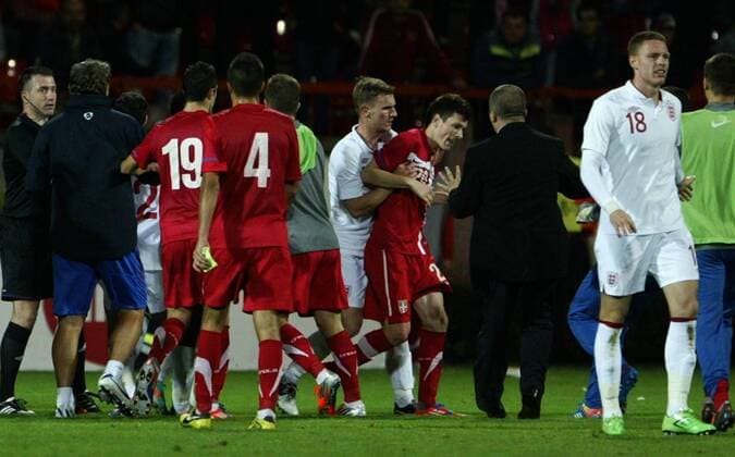 16.10.2012 Krusevac(Serbia) Serbia-England UEFA Under 21 Euro qualify play off men s football After match Connor Wickham(r) and Tom Lees(4th from right) England stoped Nikola Ninkovic(3rd from right) Serbia and Huseyin Gocek(L) Turkey referee 
