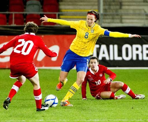 Växjö Sweden 2012 10 23 Exhibitions game Ladies 2012 Sweden vs Schweiz Lotta Schelin(SWE) and Ramona Bachmann(SCH) 