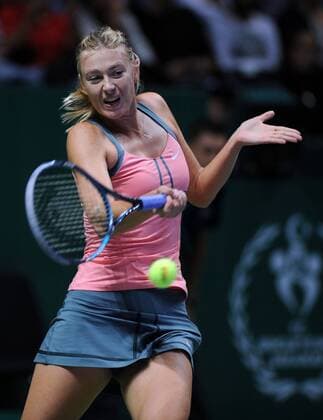 ISTANBUL, Oct. 24, 2012 - Maria Sharapova of Russia hits a return during her match at WTA Tennis Damen Championships 2012 in Istanbul of Turkey on Oct. 24, 2012. TURKEY-ISTANBUL-WTA CHAMPIONSHIPS 