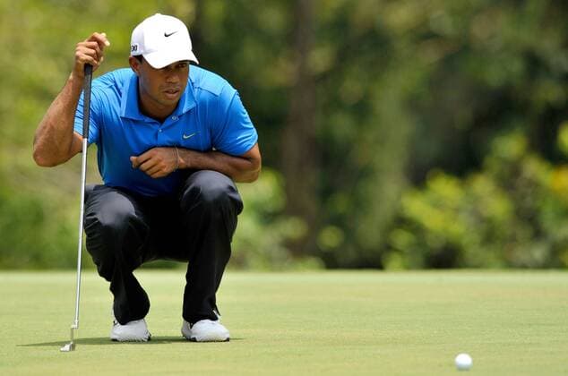 Oct. 25, 2012 - Kuala Lumpur, Malaysia - TIGER WOODS of the U.S. lines up his putt on the sixth hole during the first round of the CIMB Classic golf tournament at the Mines Resort and Golf Club in Kuala Lumpur. Golf 2012 - CIMB Classic PGA Golf Herren Malaysia - First Round - ZUMAz93