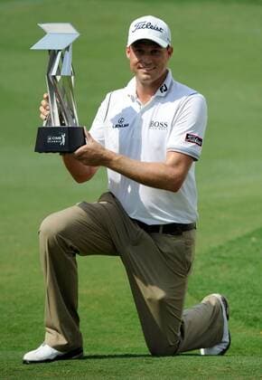 Oct. 28, 2012 - Kuala Lumpur, Malaysia - NICK WATNEY of the U.S. poses with the winners trophy after winning the CIMB Classic golf tournament at the Mines Resort and Golf Club in Kuala Lumpur. Golf 2012 - CIMB Classic - Day 4 - ZUMAz93