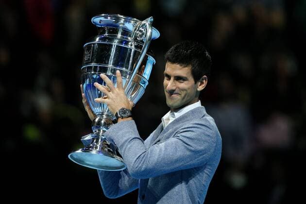 Tennis - ATP Tennis Herren World Tour finals 2012 - The O2 Arena Novak Djokovic is presented with the ATP Tennis Herren world no.1 trophy at the O2 Arena, London 