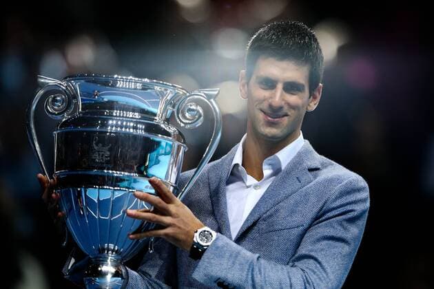 Tennis - ATP Tennis Herren World Tour finals 2012 - The O2 Arena Novak Djokovic is presented with the ATP Tennis Herren world no.1 trophy at the O2 Arena, London 