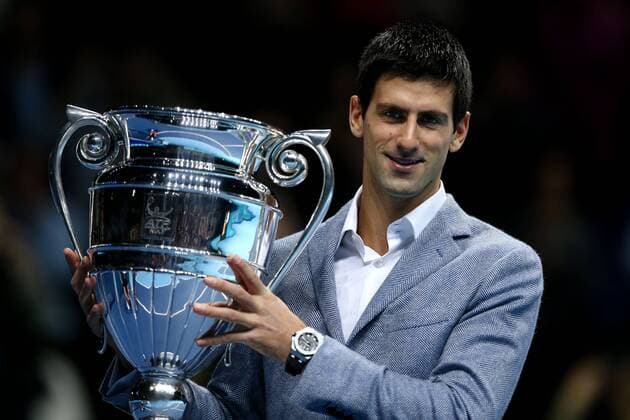 Tennis - ATP Tennis Herren World Tour finals 2012 - The O2 Arena Novak Djokovic is presented with the ATP Tennis Herren world no.1 trophy at the O2 Arena, London 