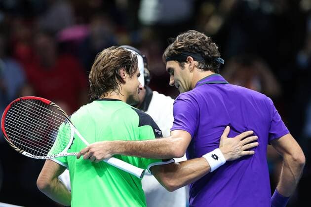 Tennis - ATP Tennis Herren World Tour finals 2012 - The O2 Arena - Roger Federer (SUI) and David Ferrer (ESP) share a smile after the match at the O2 Arena, London 