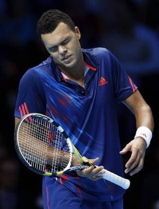 Jo-Wilfried Tsonga of France reacts during the men s singles match at the ATP Tennis Herren World Tour Finals in the O2 Arena in London, Britain, on Nov. 9, 2012. . (Xinhua Wang Lili) 