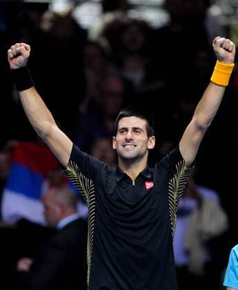 Novak Djokovic of Serbia jubilates after the men s singles match at the ATP Tennis Herren World Tour Finals in the O2 Arena in London, Britain, on Nov. 9, 2012. (Xinhua Tang Shi) BRITAIN-LONDON-TENNIS-ATP-FINALS-DJOKOVIC-BERDYCH 