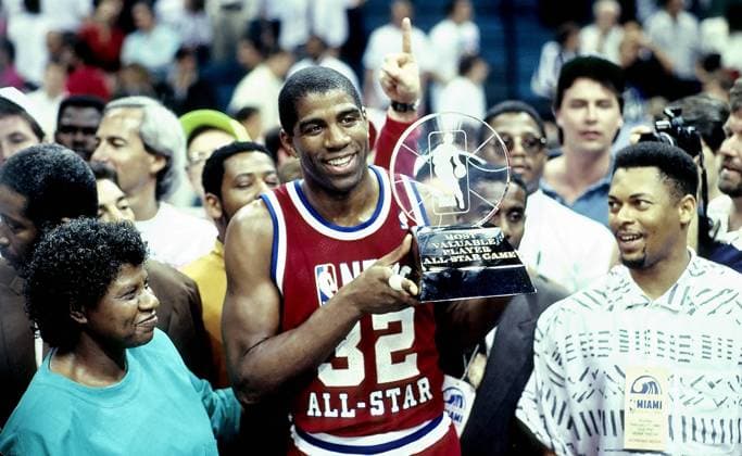 Feb. 11, 1990 - Miami, Florida, U.S. - Los Angeles Lakers EARVIN MAGIC JOHNSON awarded 1990 NBA Basketball Herren USA All-Star game MVP trophy,with Mom to left NBA Basketball Herren USA 1990 - Magic Johnson 1990 NBA Basketball Herren USA All-Star Game  - ZUMAl10