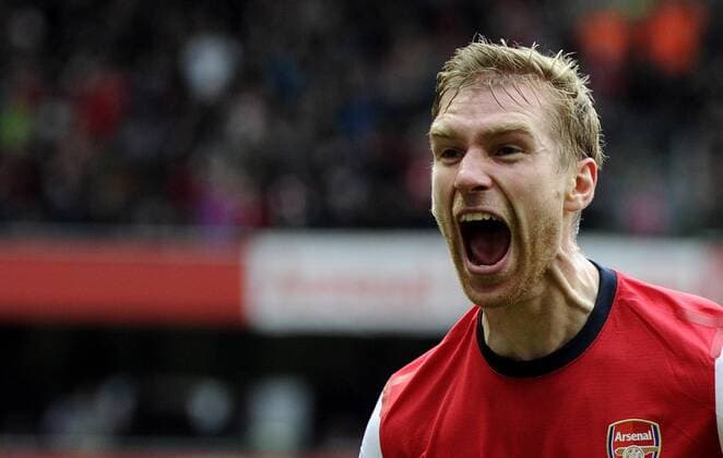 Premier League - Football - Arsenal FC London v Tottenham Hotspur - Per Mertesacker celebrates his goal 