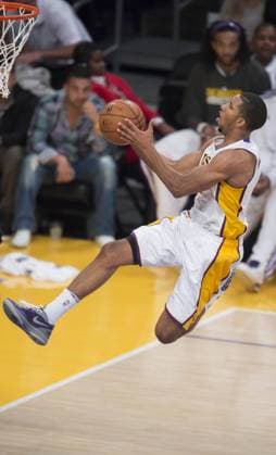 LOS ANGELES, Nov. 18, 2012 - Darius Morris of Los Angeles Lakers goes to the basket during the NBA Basketball Herren USA basketball game against Houston Rockets in Los Angeles, the United States, on Nov. 18, 2012. Lakers won 119-108. (Xinhua Yang Lei) U.S.-LOS ANGELES-NBA-LAKERS VS ROCKETS 