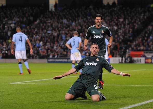 Karim Benzema of Real Madrid celebrates scoring the first goal - UEFA Champions League Group D - Manchester City vs Real Madrid - Etihad Stadium - Manchester - 21 11 12 - EDITORIAL USE ONLY. No use with unauthorised audio, video, data, fixture lists, club league logos or live services. Online in-match use limited to 120 images, no video emulation. No use in betting, games or single club league player publications.