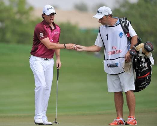 GOLF - DB World Tour Championship, Race to Dubai DUBAI,VEREINIGTE ARABISCHE EMIRATE,24.NOV.12 - DIVERS, GOLF - DB World Tour Championship, Race to Dubai, Jumeirah Golf Estates. Bild zeigt Rory McIllroy (NIR) mit seinem Caddy. 
